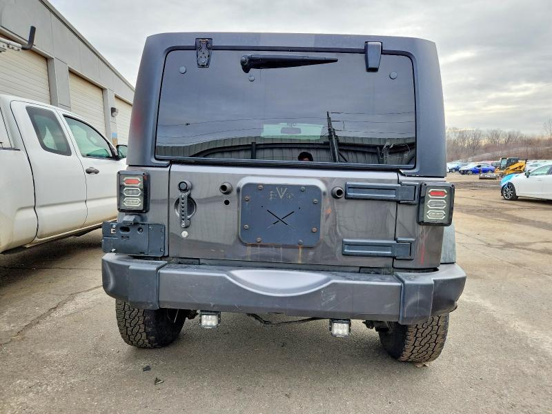 Photo 6 from auction – 2016 JEEP WRANGLER U with VIN 1C4BJWDG4GL292213