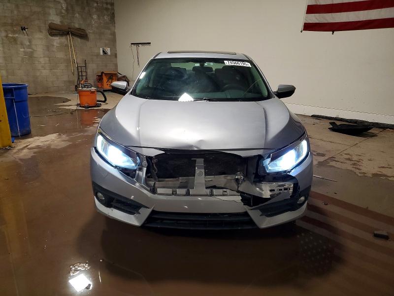 Photo 5 from auction – 2017 HONDA CIVIC with VIN 19XFC1F35HE205759