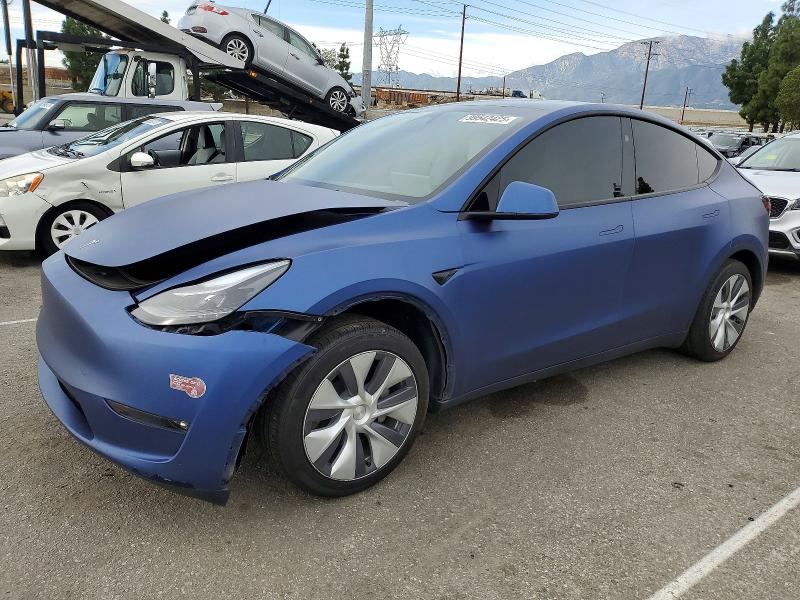 TESLA MODEL Y 2023 with VIN 7SAYGDEE7PF899660 - Photo from auction