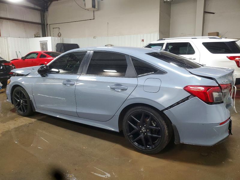 Photo 2 from auction – 2023 HONDA CIVIC SPOR with VIN 2HGFE2F52PH555761