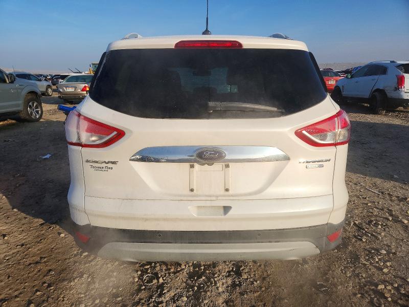 Photo 6 from auction – 2014 FORD ESCAPE TIT with VIN 1FMCU9J90EUA16004