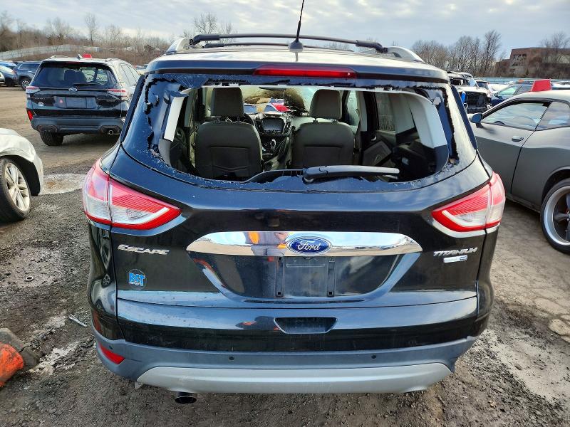 Photo 6 from auction – 2015 FORD ESCAPE TIT with VIN 1FMCU9JX1FUA21292