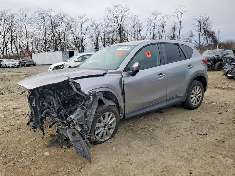 MAZDA CX-5 2014 with VIN JM3KE2BE0E0398436 - Photo from auction