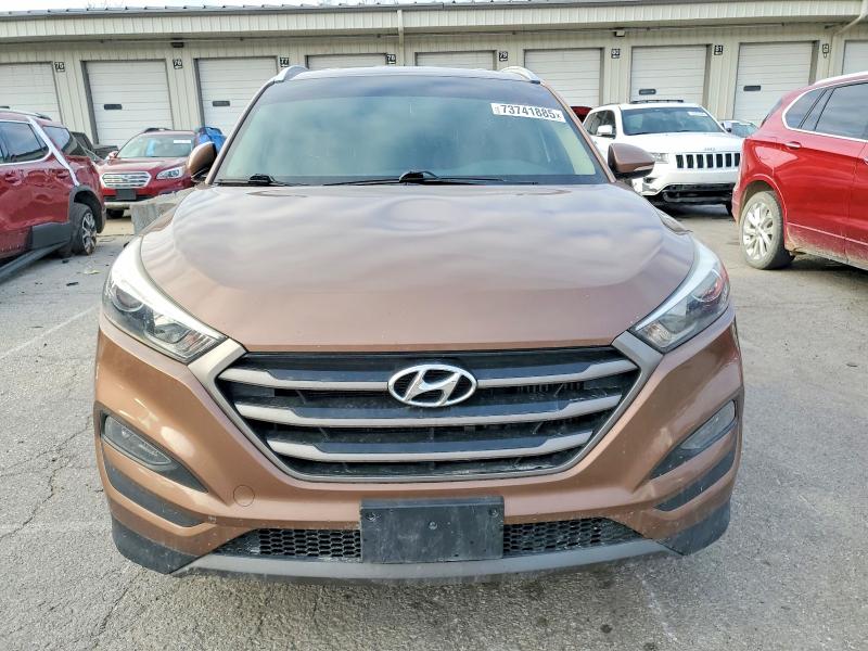 Photo 5 from auction – 2016 HYUNDAI TUCSON LIM with VIN KM8J3CA24GU052694