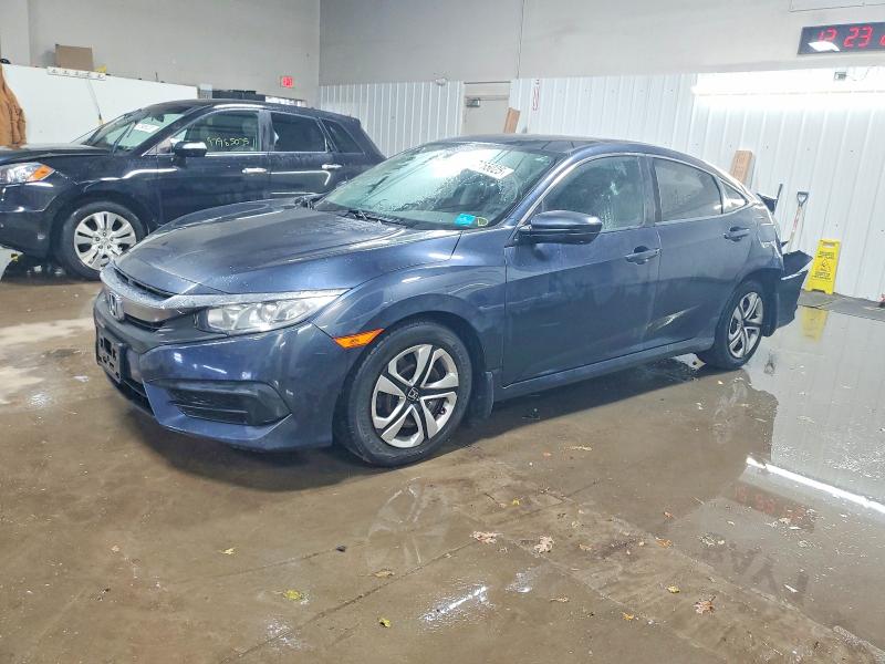 Photo 1 from auction – 2018 HONDA CIVIC with VIN 19XFC2F54JE024732