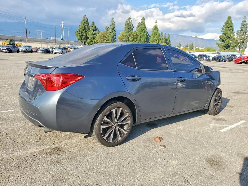 Photo 3 from auction – 2017 TOYOTA COROLLA L with VIN 5YFBURHEXHP647671