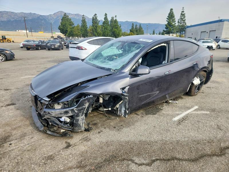 TESLA MODEL Y 2026 with VIN 7SAYGDED2TF443440 - Photo from auction