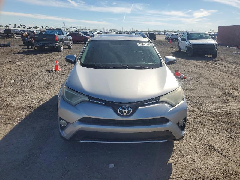 Photo 5 from auction – 2016 TOYOTA RAV4 with VIN 2T3WFREV1GW301304