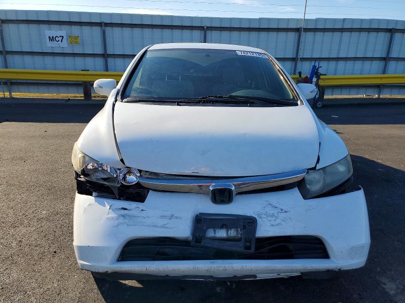 Photo 5 from auction – 2006 HONDA CIVIC HYBR with VIN JHMFA36236S028601
