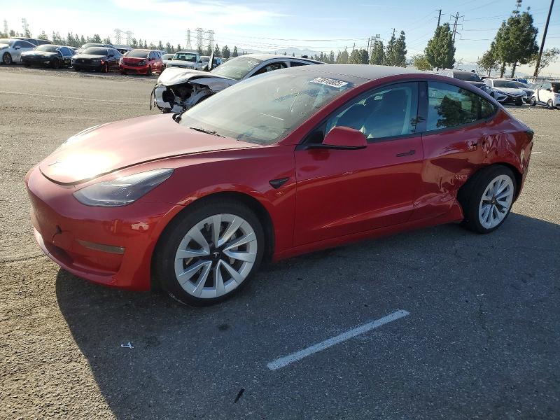 TESLA MODEL 3 2022 with VIN 5YJ3E1EB0NF186064 - Photo from auction