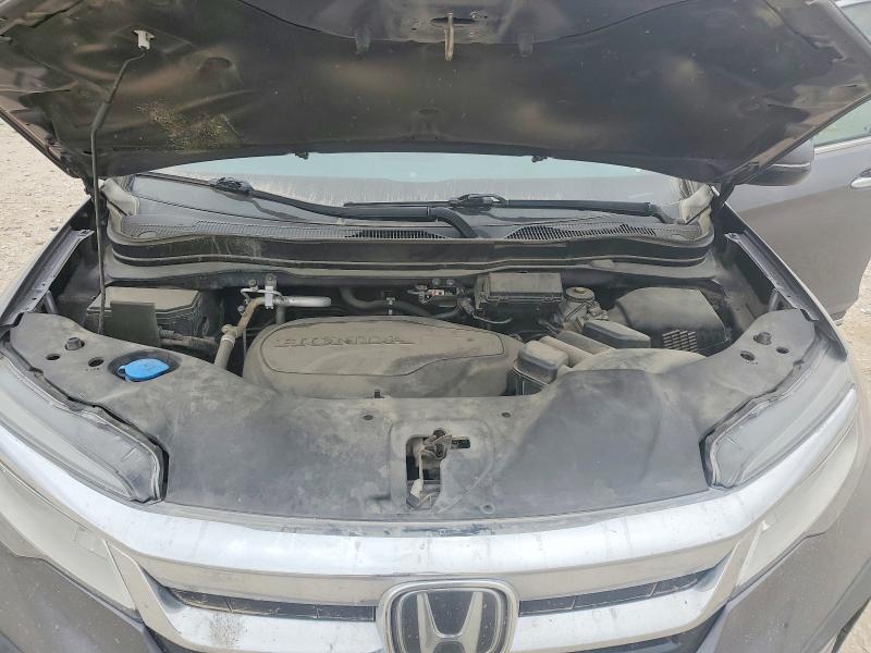 Photo 12 from auction – 2022 HONDA PILOT TOUR with VIN 5FNYF5H92NB006599
