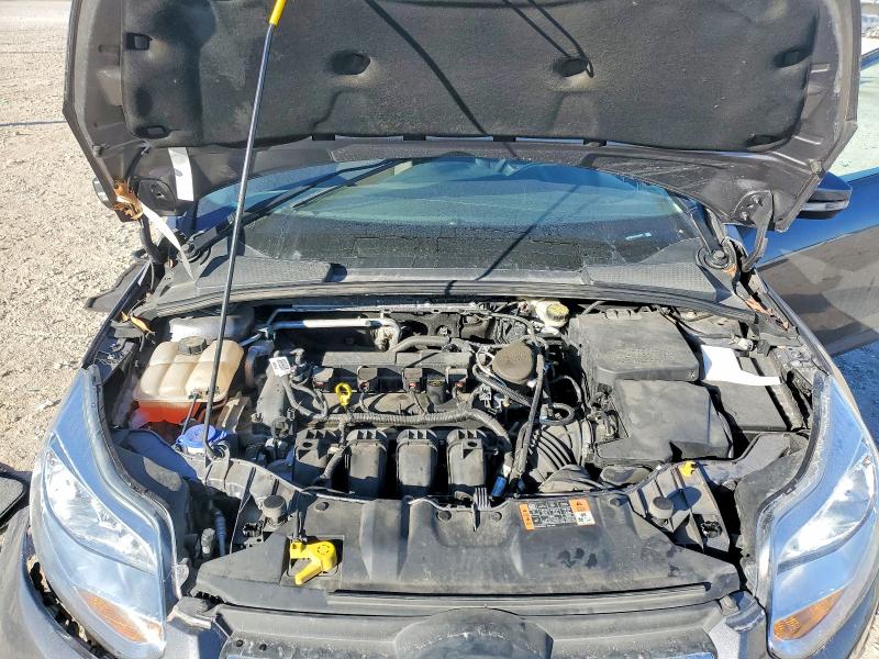 Photo 11 from auction – 2014 FORD FOCUS with VIN 1FADP3F24EL440077