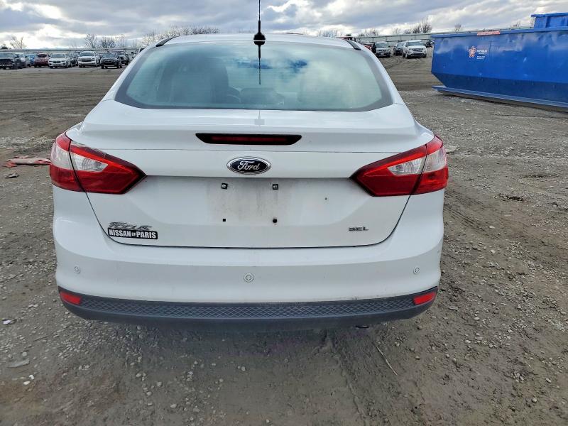 Photo 6 from auction – 2012 FORD FOCUS with VIN 1FAHP3H20CL469040