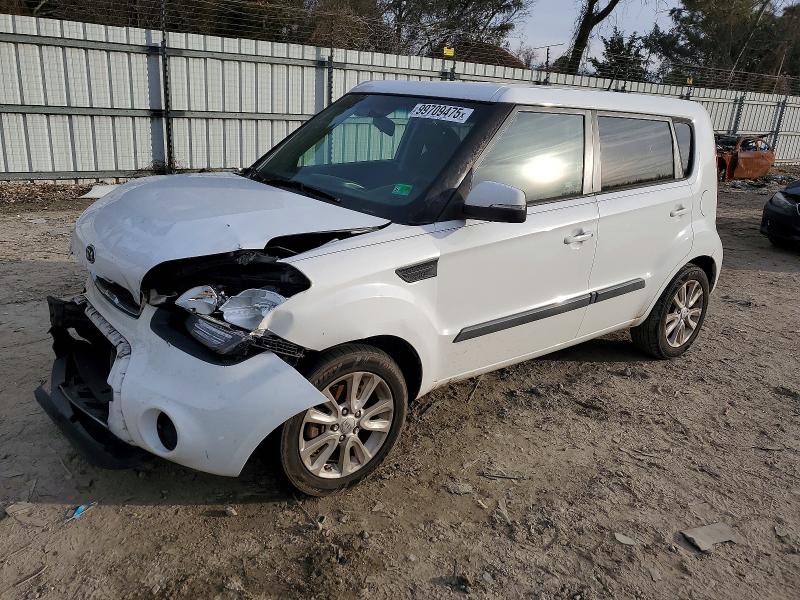 KIA SOUL + 2012 with VIN KNDJT2A65C7374612 - Photo from auction