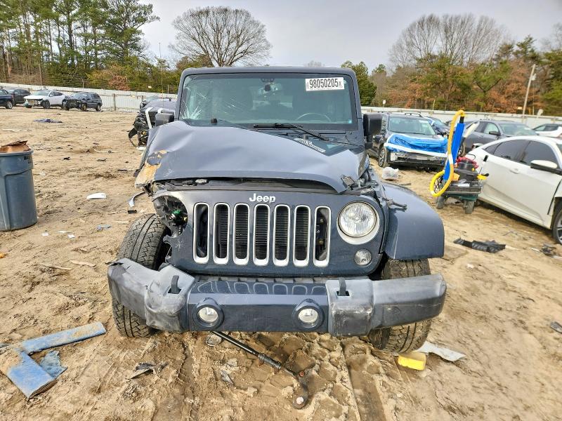 Photo 5 from auction – 2016 JEEP WRANGLER U with VIN 1C4BJWEG8GL258595