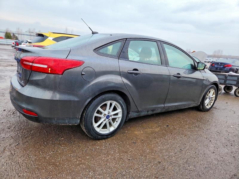 Photo 3 from auction – 2016 FORD FOCUS SE with VIN 1FADP3F2XGL316513