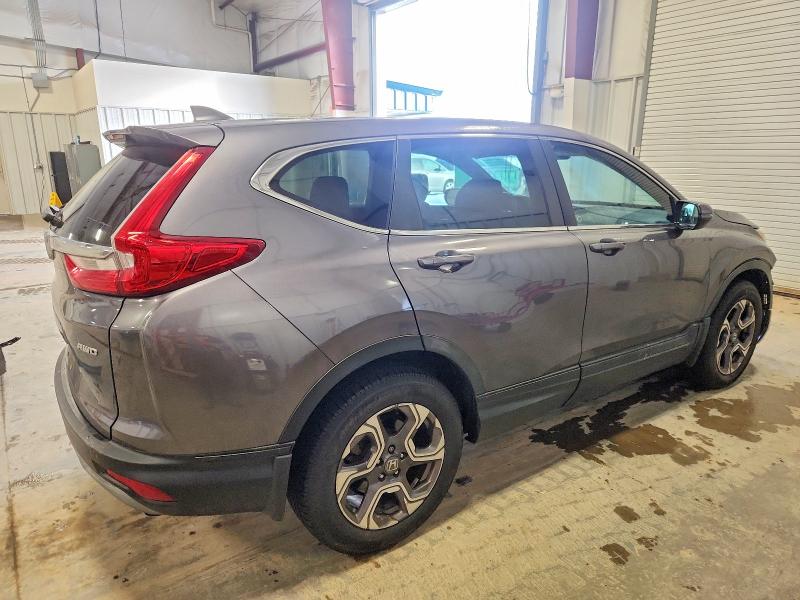 Photo 3 from auction – 2018 HONDA CR-V EX with VIN 7FARW2H59JE067446