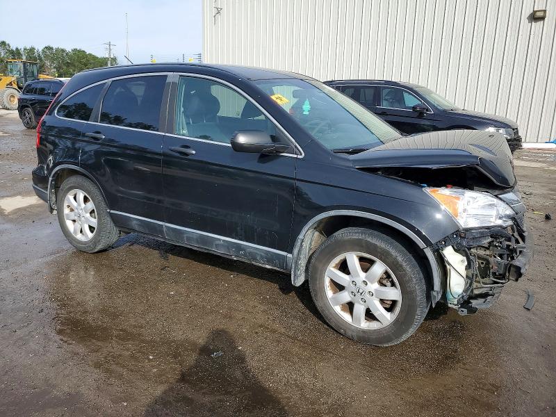 Photo 4 from auction – 2011 HONDA CR-V SE with VIN 5J6RE3H41BL018889