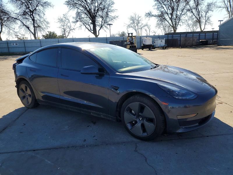 Photo 4 from auction – 2023 TESLA MODEL 3 with VIN 5YJ3E1EA8PF559734