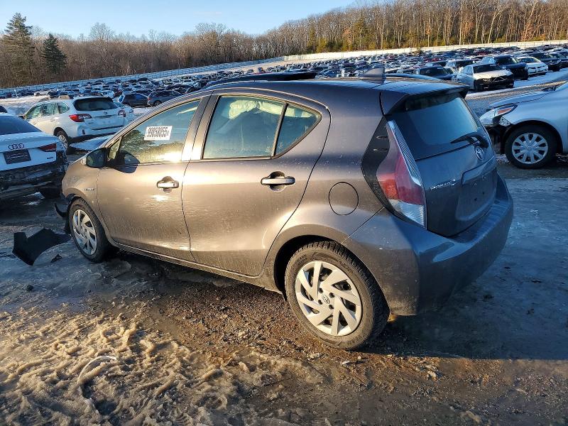 Photo 2 from auction – 2015 TOYOTA PRIUS C with VIN JTDKDTB39F1090953