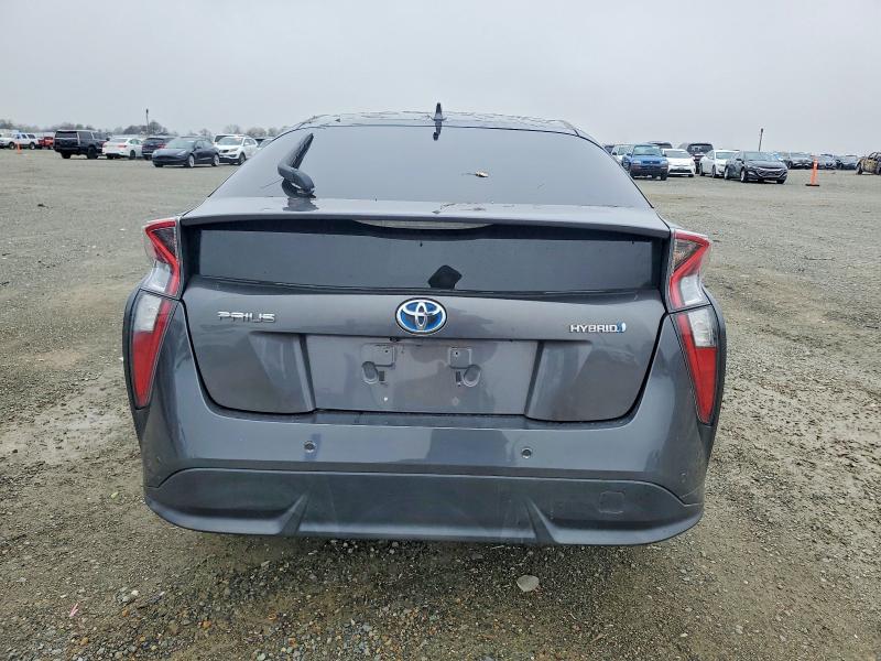 Photo 6 from auction – 2018 TOYOTA PRIUS with VIN JTDKARFU2J3064514