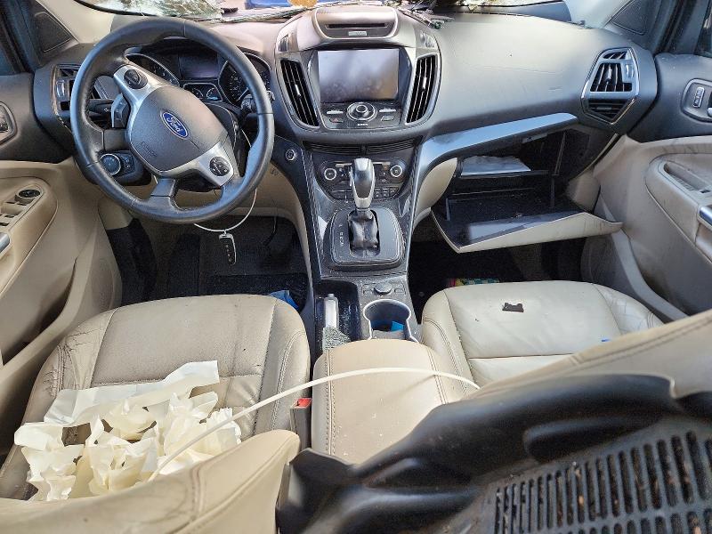 Photo 8 from auction – 2015 FORD ESCAPE TIT with VIN 1FMCU9JX1FUA21292