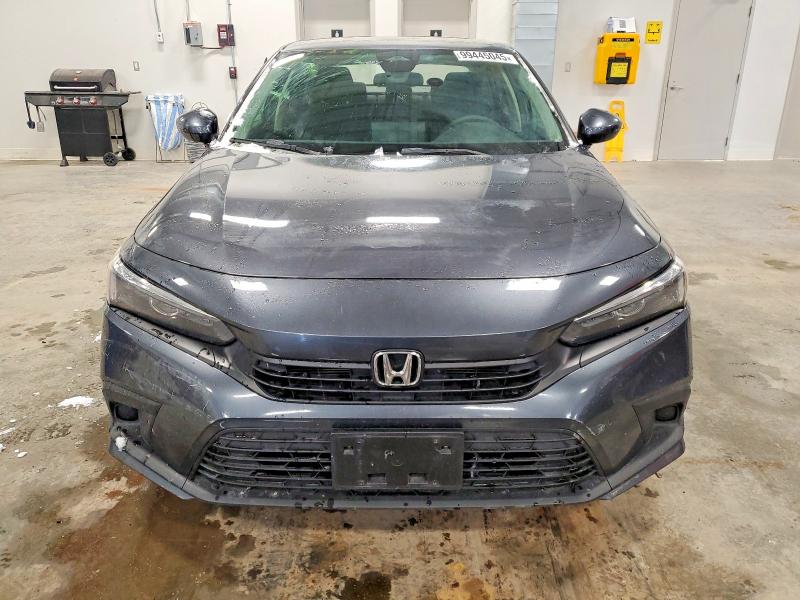Photo 5 from auction – 2022 HONDA CIVIC LX with VIN 2HGFE2F28NH120973
