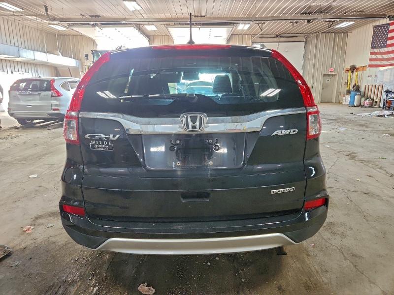 Photo 6 from auction – 2016 HONDA CR-V TOURI with VIN 5J6RM4H96GL077285