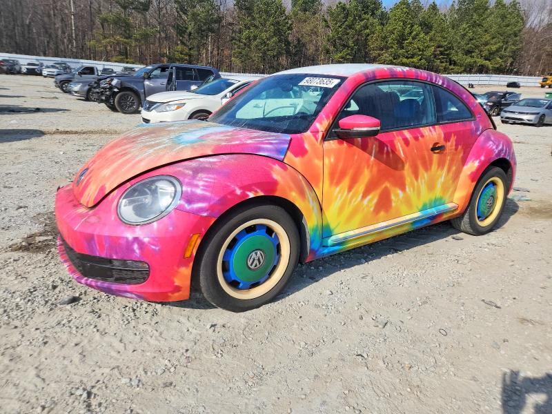 VOLKSWAGEN BEETLE 2016 with VIN 3VWF17AT5GM638032 - Photo from auction