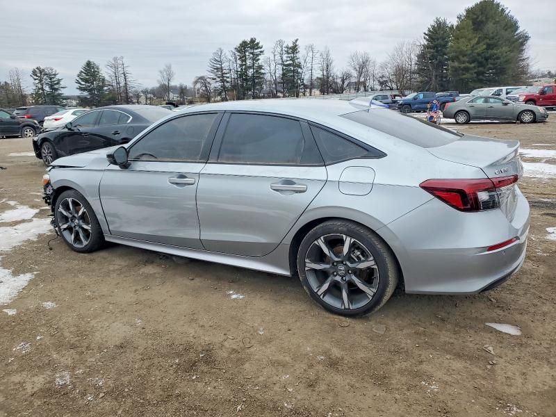 Photo 2 from auction – 2025 HONDA CIVIC SPOR with VIN 2HGFE4F84SH302102