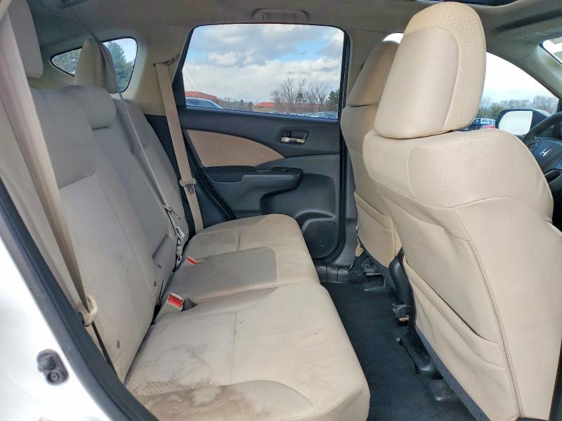 Photo 11 from auction – 2015 HONDA CR-V with VIN 5J6RM4H57FL043612