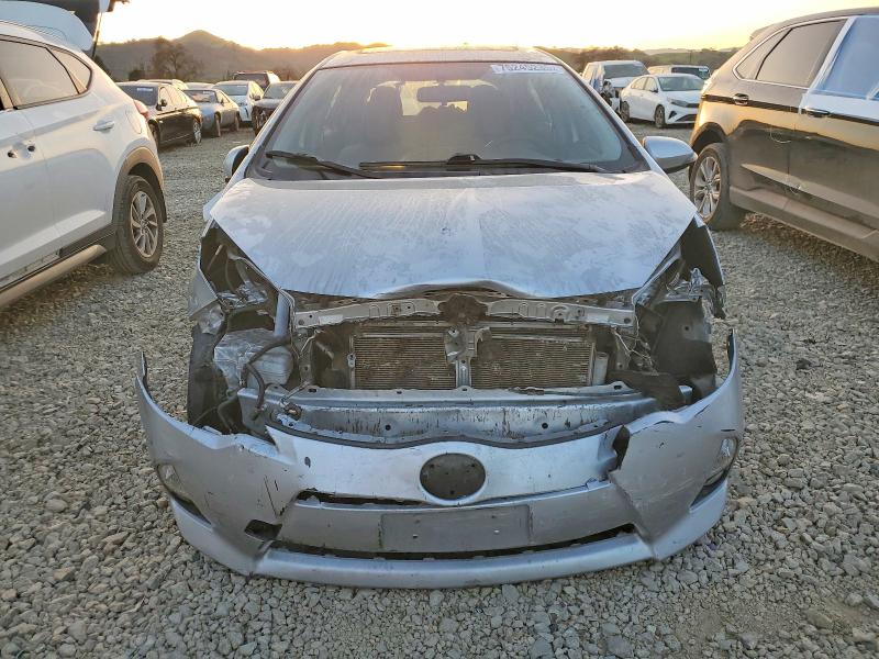 Photo 5 from auction – 2014 TOYOTA PRIUS C with VIN JTDKDTB34E1082239