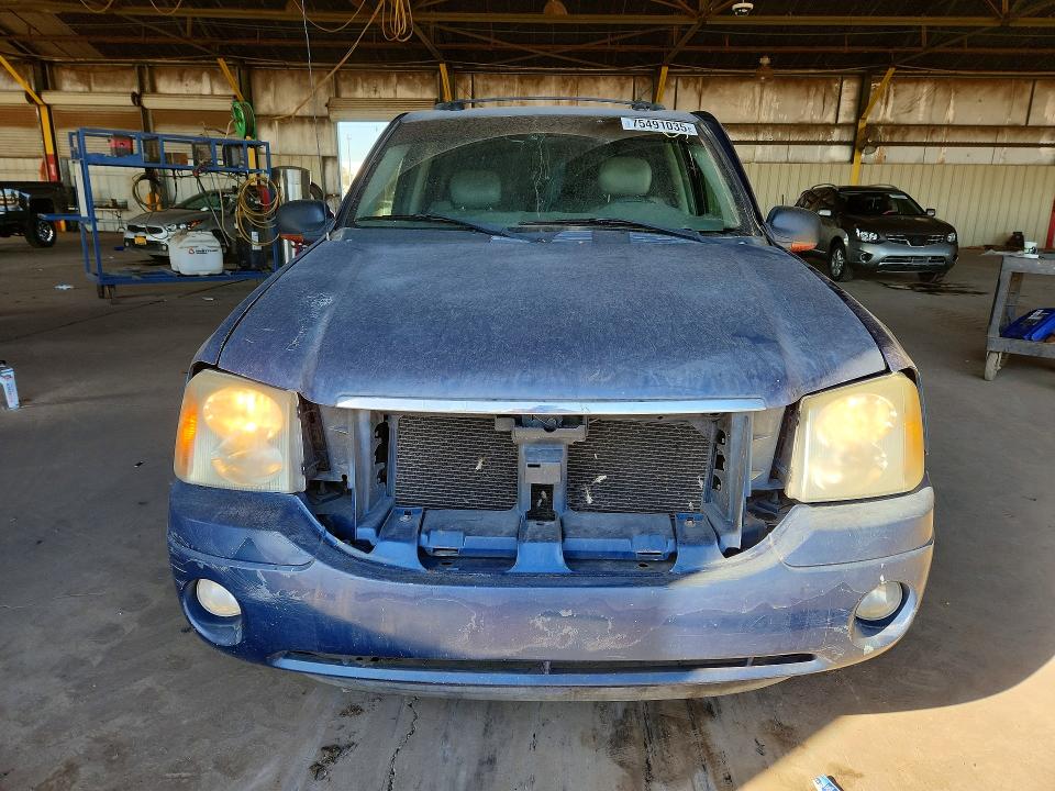Photo 5 from auction – 2005 GMC ENVOY with VIN 1GKDS13S652336749