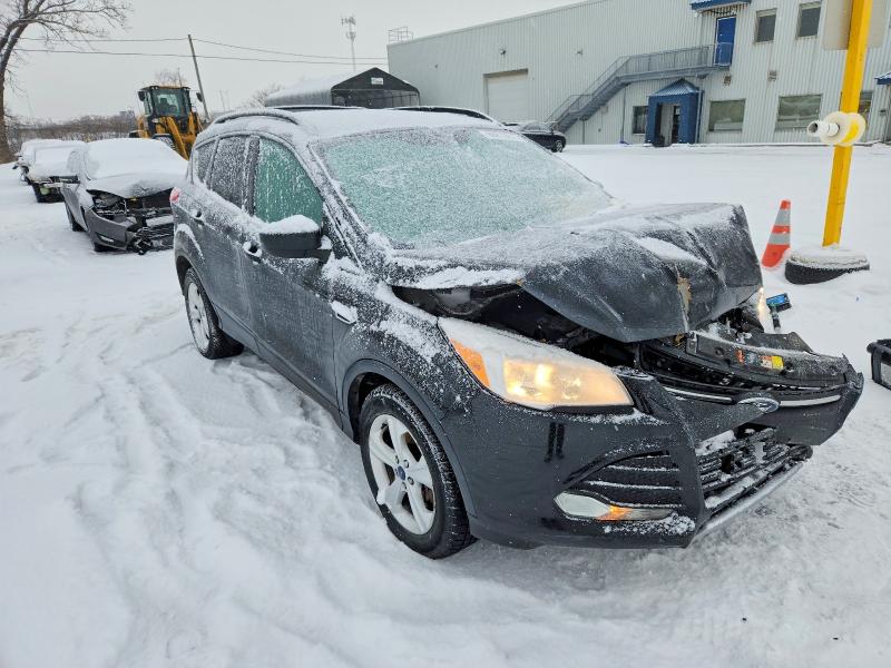 Foto 4 de la subasta – 2015 FORD ESCAPE SE con VIN 1FMCU9GXXFUC69841