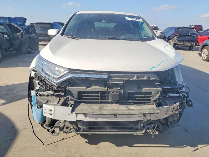 Photo 5 from auction – 2022 HONDA CR-V with VIN 5J6RT6H56NL013871