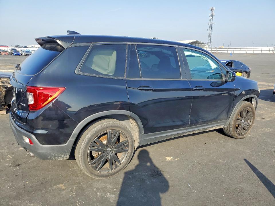 Photo 3 from auction – 2021 HONDA PASSPORT with VIN 5FNYF7H28MB002876