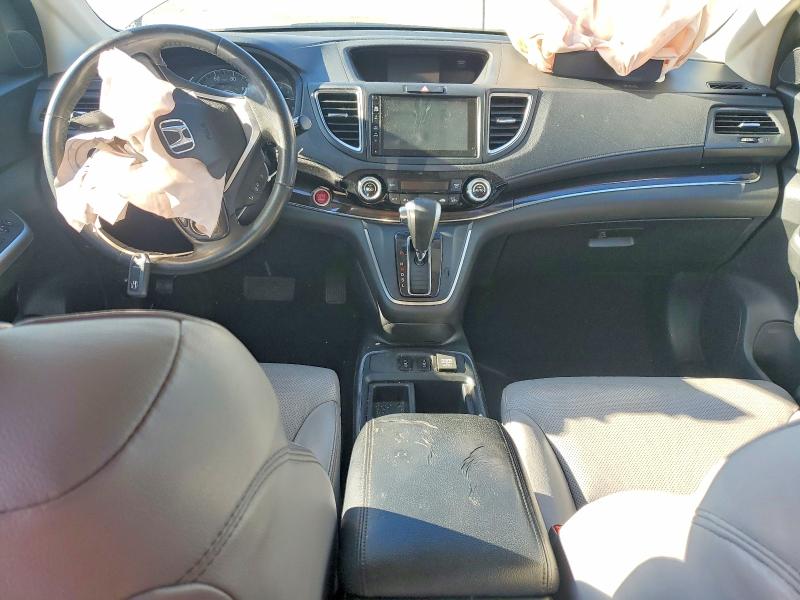 Photo 8 from auction – 2016 HONDA CR-V with VIN 2HKRM3H77GH565101