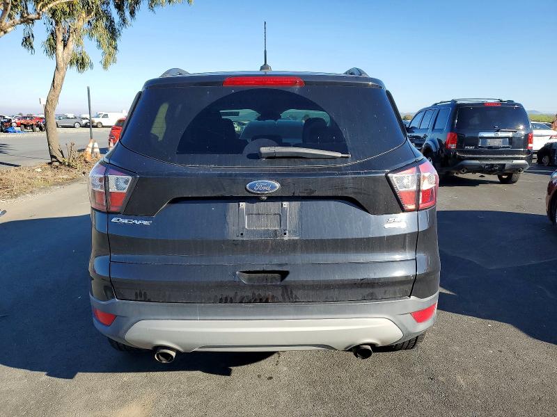 Photo 6 from auction – 2018 FORD ESCAPE SE with VIN 1FMCU0GD9JUB10495