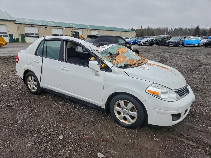 Photo 4 from auction – 2009 NISSAN VERSA S with VIN 3N1BC11EX9L495780