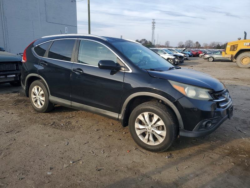 Photo 4 from auction – 2013 HONDA CR-V with VIN 2HKRM4H72DH631099