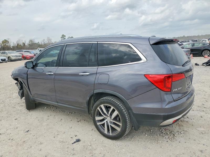 Photo 2 from auction – 2017 HONDA PILOT TOUR with VIN 5FNYF5H91HB020742