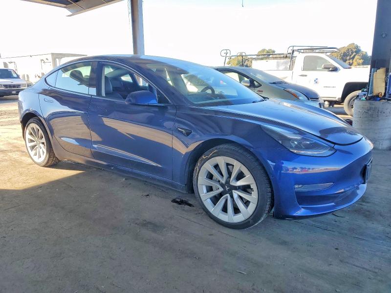 Photo 4 from auction – 2022 TESLA MODEL 3 with VIN 5YJ3E1EB5NF177747