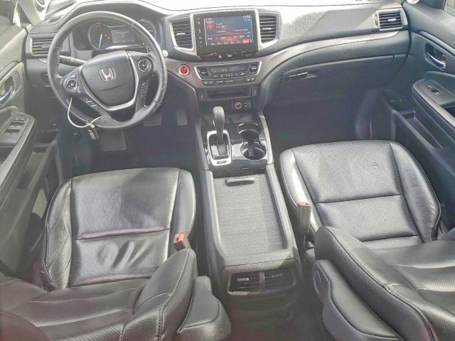 Photo 8 from auction – 2017 HONDA RIDGELINE with VIN 5FPYK2F65HB009558