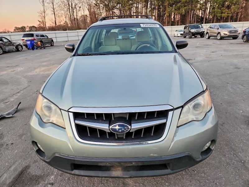 Photo 5 from auction – 2009 SUBARU OUTBACK 2. with VIN 4S4BP61C097311010