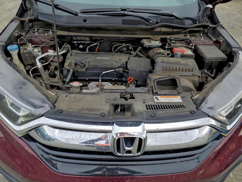 Photo 12 from auction – 2017 HONDA CR-V LX with VIN 7FARW5H30HE005265