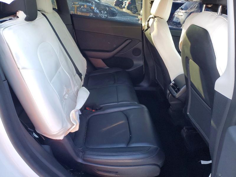 Photo 10 from auction – 2023 TESLA MODEL Y with VIN 7SAYGAEE6PF585481