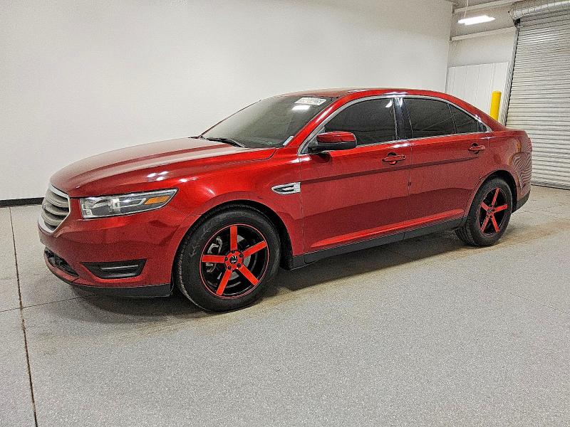 FORD TAURUS SEL 2017 with VIN 1FAHP2E85HG144581 - Photo from auction