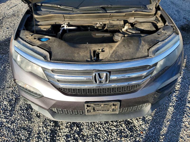 Photo 12 from auction – 2017 HONDA PILOT EXL with VIN 5FNYF5H54HB021557