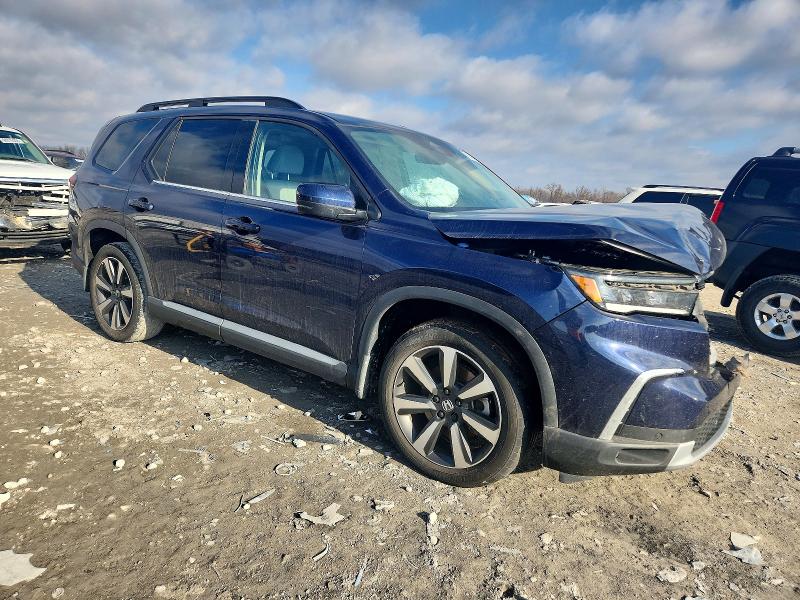Photo 4 from auction – 2023 HONDA PILOT TOUR with VIN 5FNYG2H76PB005646
