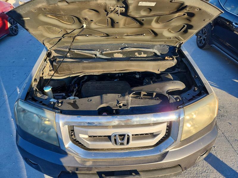 Photo 12 from auction – 2011 HONDA PILOT TOUR with VIN 5FNYF3H98BB003836